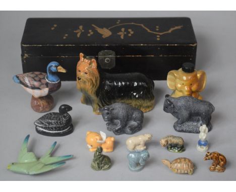 A Lacquered Oriental Box Containing Various Ceramic Animal and Bird Ornaments 
