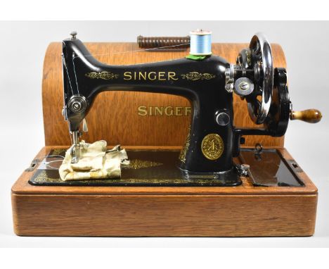 A Vintage Oak Cased Manual Singer Sewing Machine 
