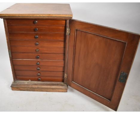 A Late 19th/Early 20th Century Mahogany Ten Drawer Collectors Cabinet with Panelled Door and Replacement Top, 48cm wide and 6