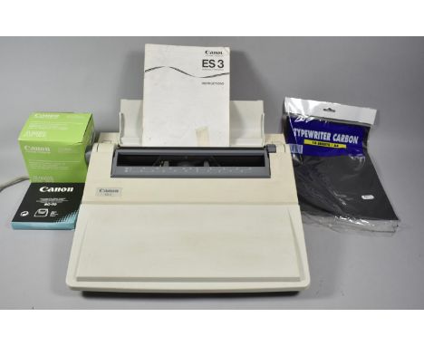 A Vintage Canon ES3 Electric Typewriter with Some Accessories 