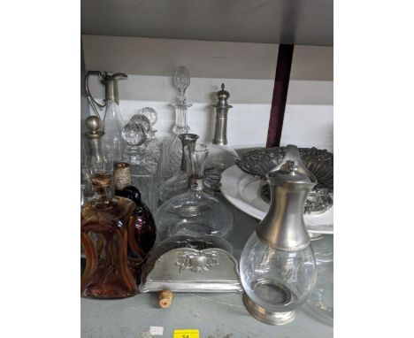 A mixed lot of glassware and ceramics, and pewter ware to include a Victorian amber glass sherry decanter with white metal co