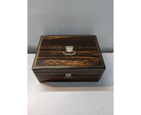 A late Georgian Amboyna writing box with fitted interior and mother of pearl escutcheons Location: 