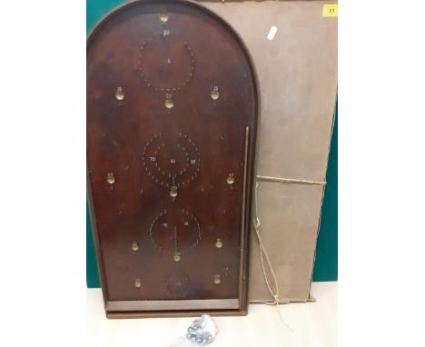 A vintage 'Orient' bagatelle board and steel marbles 