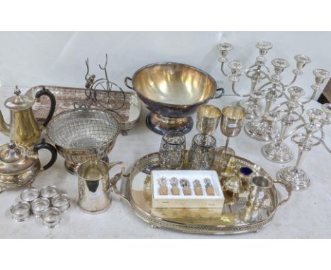 Silver plated items to include a twin handled punch bowl, a pair of goblets having engraved detail, two silver plated trays, 
