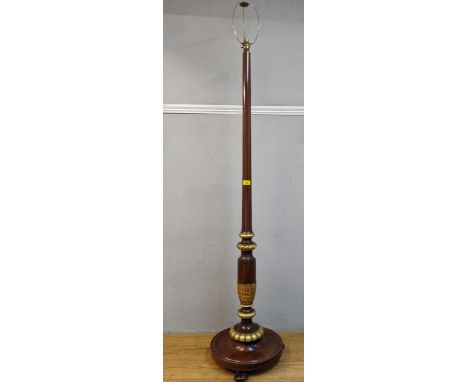 A mid 20th century gilt and mahogany standard lamp, with carved acanthus ornamentLocation: 
