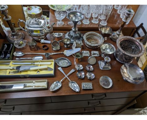 A mixed lot of silver plate to include a pair of Sheffield plated candlesticks, wine coaster and bottle holder, Danish candle