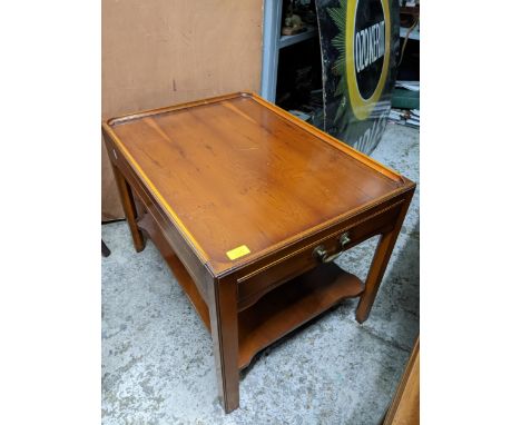 A pair of Bevan and Funnel yew wood lamp tables, one side drawer and one blind drawer, square legs united by undertier, each 