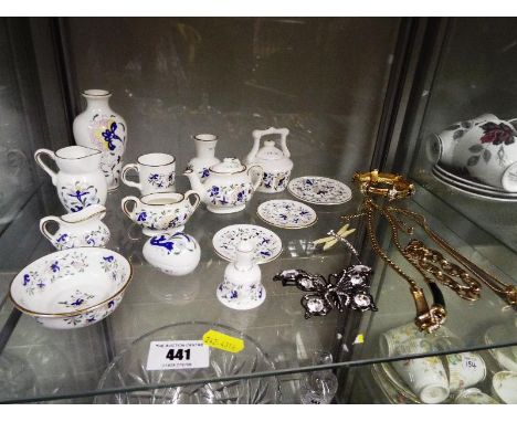 A 16 piece Coalport miniature tea service in the Pageant pattern and a small collection of good costume jewellery. (qty)