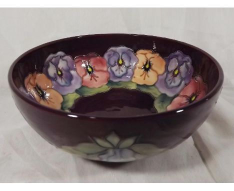 A Moorcroft large pedestal bowl decorated with pansy's on a magenta ground 9cm (h) x 20.5cm (dia) - Est £100 - £140