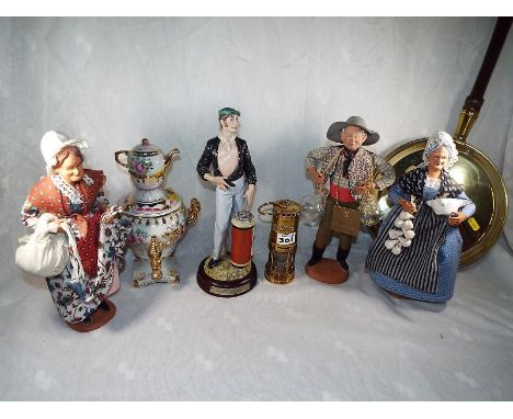 A good mixed lot to include a brass bed warmer, a miniature oil lamp, a ceramic samovar and four clay figurines, signed to th