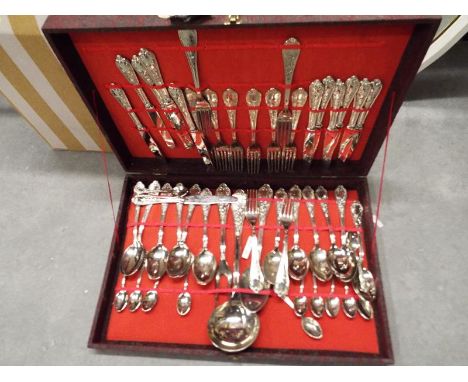 A boxed canteen of cutlery, included in the lot is an oval bevil edged wooden framed mirror and five framed pictures, a walki