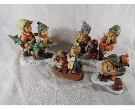 Four modern Goebel figurines (4)
