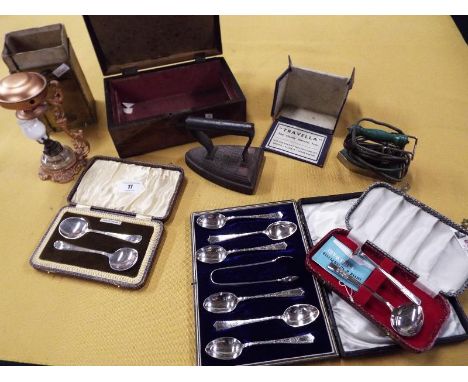 A mixed lot to include cased plated flat ware, a Travella portable iron, a flat iron, a mahogany stationery box, and a miniat