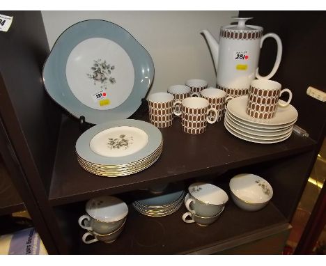 A tea service by Royal Doulton decorated in the Rose Elegans pattern, six place setting comprising 21 pieces and a German cof