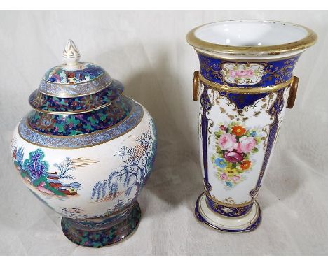 A Noritake vase, 24 cm (h) and a decorative hand painted ginger jar with Oriental scenes, factory marks to the base approxima