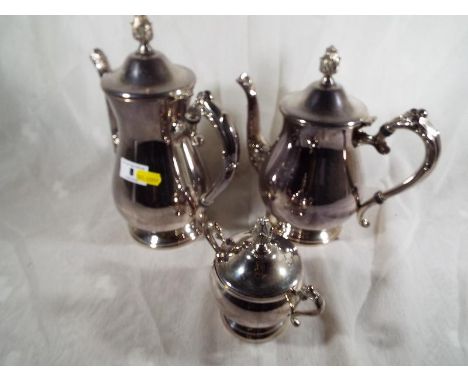 A plated three piece tea / coffee service with lidded sugar bowl