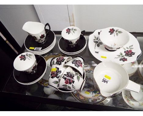 A collection of ceramic tableware by Royal Albert decorated in the Masquerade pattern (qty)