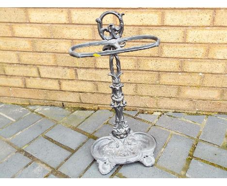 A wrought iron stick stand 59 cm (h)