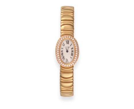 A Lady's 18ct Gold Diamond Set Oval Shaped Wristwatch, signed Cartier, model: Baignoire, ref: 2368, circa 2000, quartz moveme