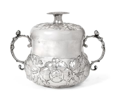 A Charles II Provincial Silver Twin Handled Porringer and Cover, Marmaduke Best, York 1674, the lower body chased with flower