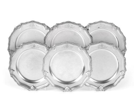 A Set of Six George II and Later Silver Dinner Plates, two with indistinct partial marks, probably that of David Willaume, Lo