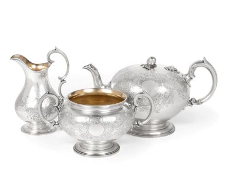 A Victorian Silver Three Piece Tea Service, Edward &amp; John Barnard, London 1855, circular on pedestal foot, the teapot wit