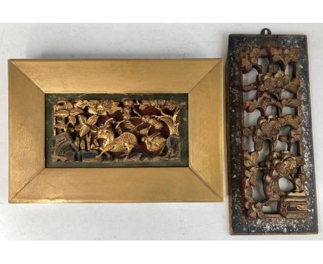 A Chinese 19th century relief carved and gilt decorated wall plaque, decorated with deer within a tree-lined landscape, house