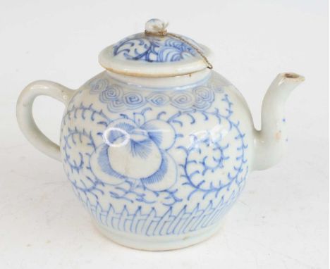 A Chinese late Qing Dynasty (1644-1912) blue and white stoneware teapot and cover, Xuantong period, of bullet shape, undergla