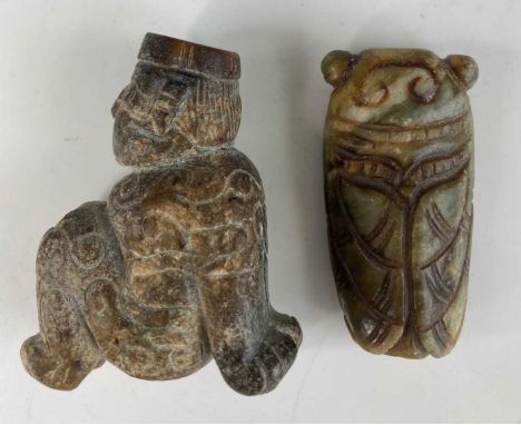 A Chinese carved soapstone tassel weight in the form of a seated figure, in the style of the Six Dynasties, 5.8 x 4.5cm; toge