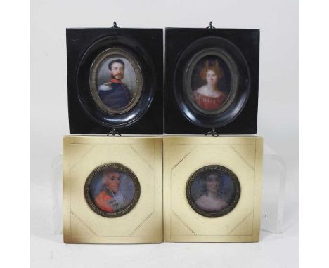 A collection of four reproduction portrait miniatures