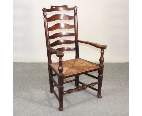 A Lancashire carver chair, with rush seat