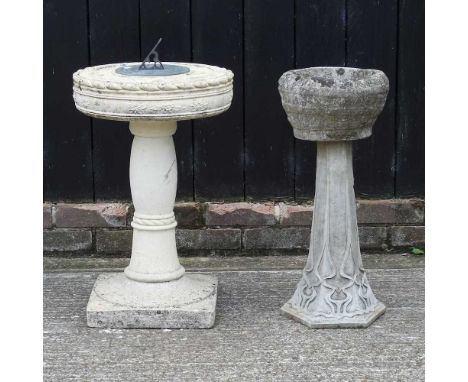 A cast stone sundial, 73cm high, together with a garden planter on stand (2)