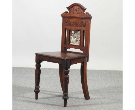 A Victorian hall chair, with a tile inset back