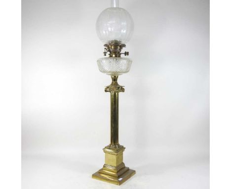 An 19th century brass Corinthian column Duplex patent oil lamp, with a clear etched glass shade, 93cm high overallCondition r