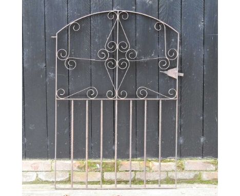 A wrought iron garden gate, 81 x 122 cm, together with an iron post