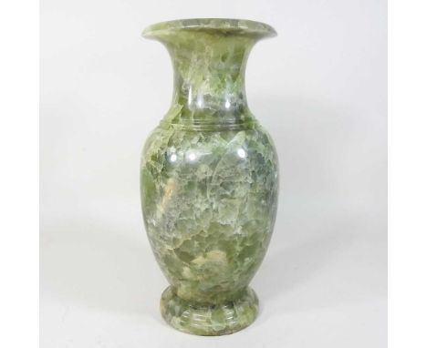 A carved stone oriental vase34cm high