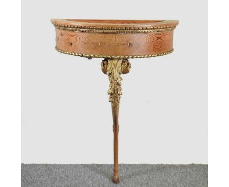 An 18th century carved and painted console table, with a pitch pine frieze and acanthus decoration, on a single support, carv