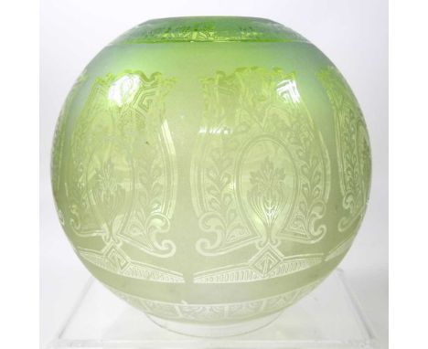 An etched green glass oil lamp shade, 19cm high