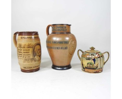 A 19th century Doulton Lambeth Benjamin Disraeli commemorative jug, 23cm high, together with another of Gladstone and a Gondo