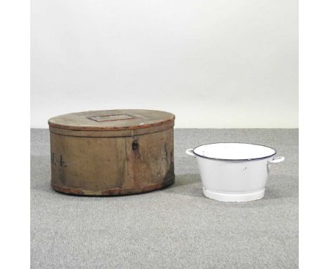 A vintage hat box, inscribed Arnolds, together with an enamel bowl (2)60w x 45d x 30h cm