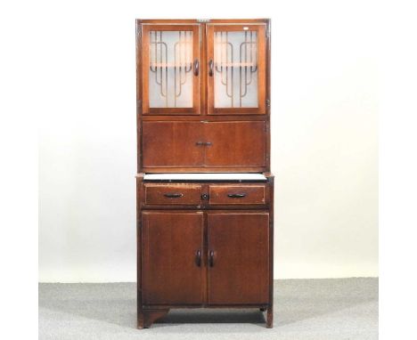 A mid 20th century kitchen utility cabinet, with an enamel top78w x 49d x 177h cm