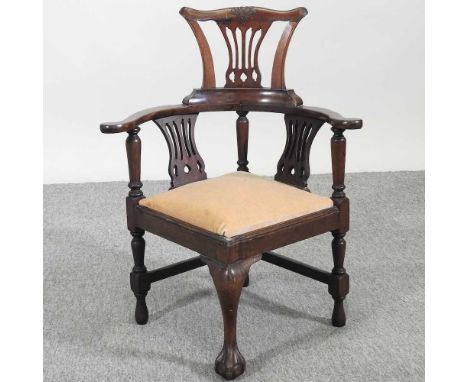 An Edwardian child's corner chair, with a padded seat