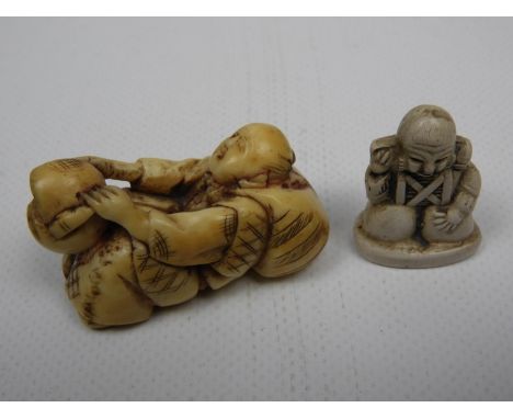 Netsuke and Resin Buddha 