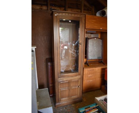 An Ercol 'Golden Dawn' bookcase, 64.5cm wide.This lot can only be collected on Saturday 1st August (10-2pm) 