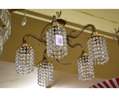 A vintage brass ceiling light, having five arms with cut glass drops,&nbsp;total height 27cm. 