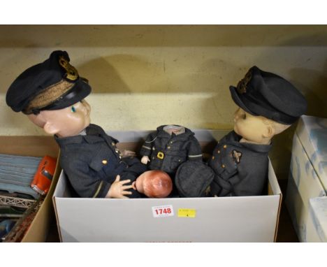 Dolls:&nbsp;two vintage plastic boy dolls, approx 40cm high, each dressed in RAF uniform, with caps; together with a smaller 