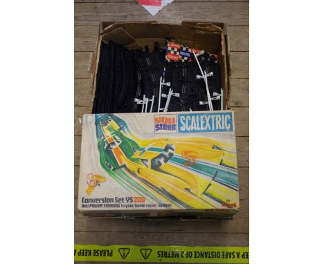 Scalextric:&nbsp;a vintage 'You Steer' Conversion Set YS200, boxed; together with a quantity of Scalextric track. 