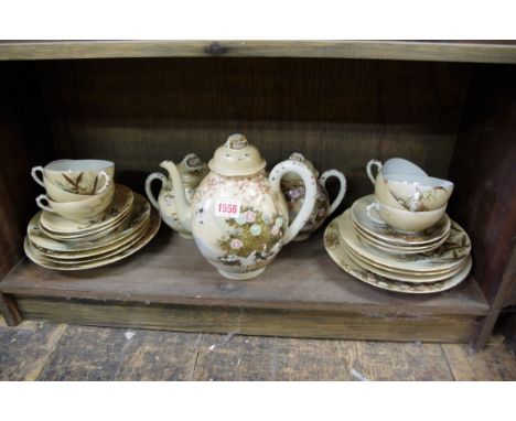 A Japanese eggshell part tea service. 