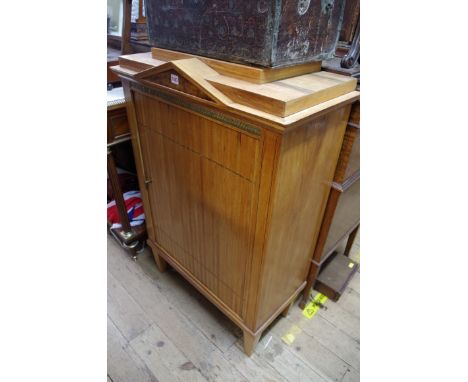 A 19th century Austrian cherry wood cabinet of architectural form,&nbsp;having horizontal tambour door, enclosing shelves and