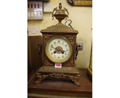 A late 19th century French brass striking mantel clock,&nbsp;40cm, with pendulum and&nbsp;key. 